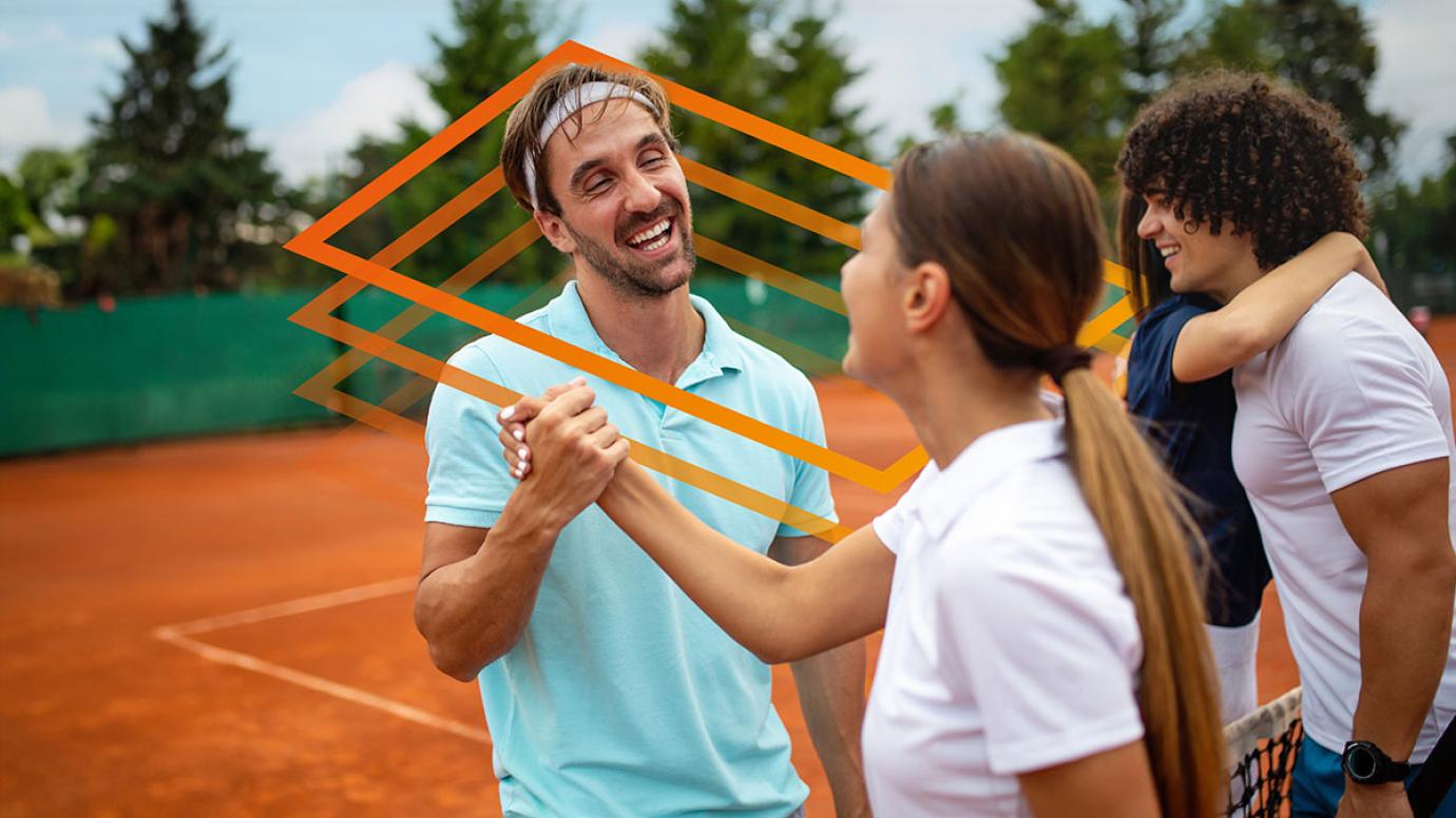 Group of tennis players shaking hands after a match