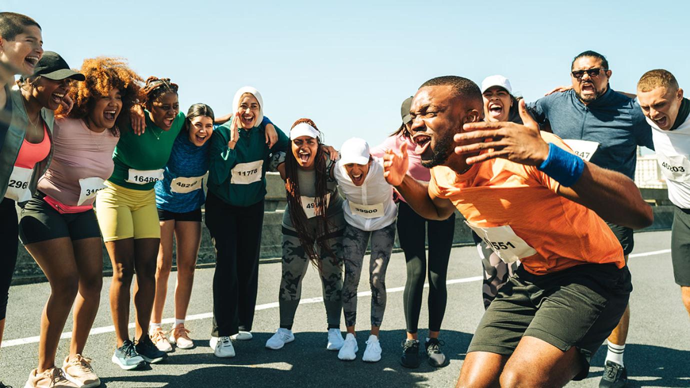 A group of athletes cheering each other on